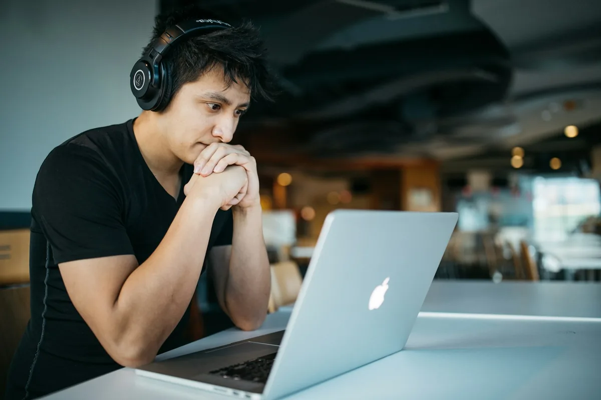 A trader listening during a live session.